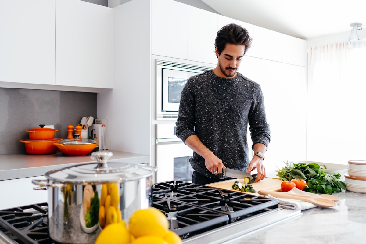 Active man preparing healthy meal
